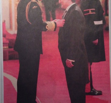 Lino Carbosiero receives his MBE from Prince Charles